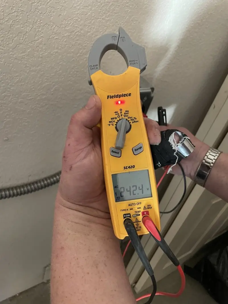 Voltage testing with clamp meter during Electrical Installation Services in Safety Harbor